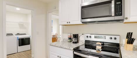 Microwave, stovetop, dishwasher, coffee/tea maker