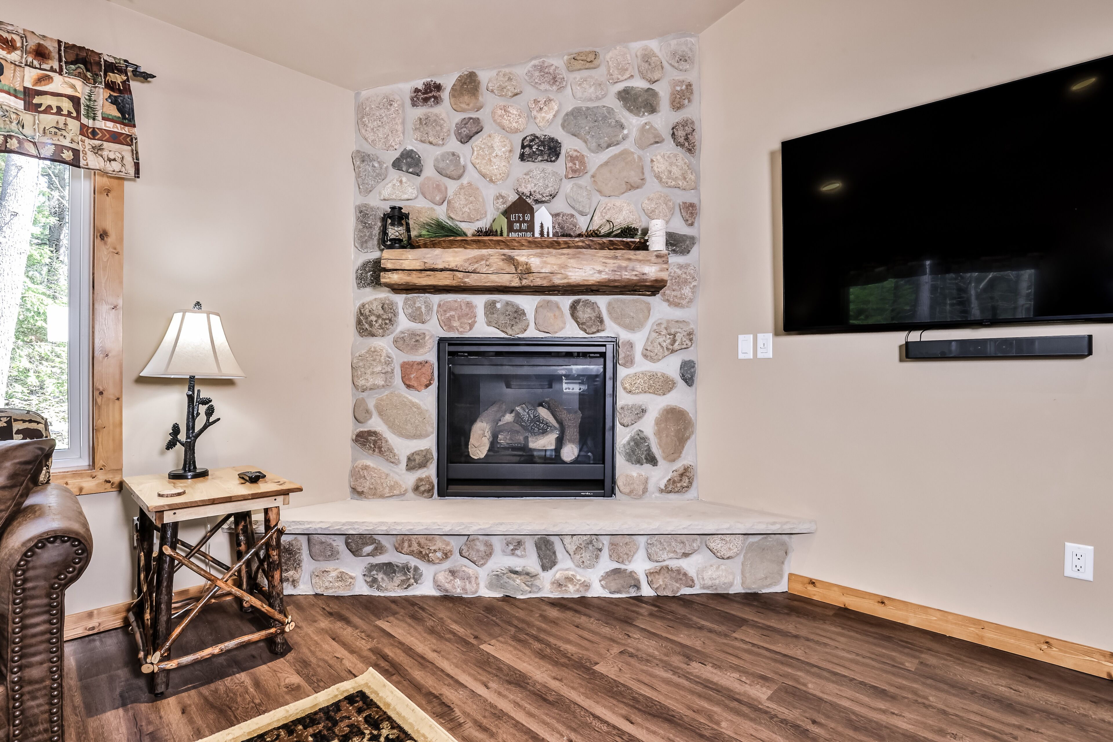 Modern dog-friendly cabins with fireplace, patio, grill, central AC, & W/D