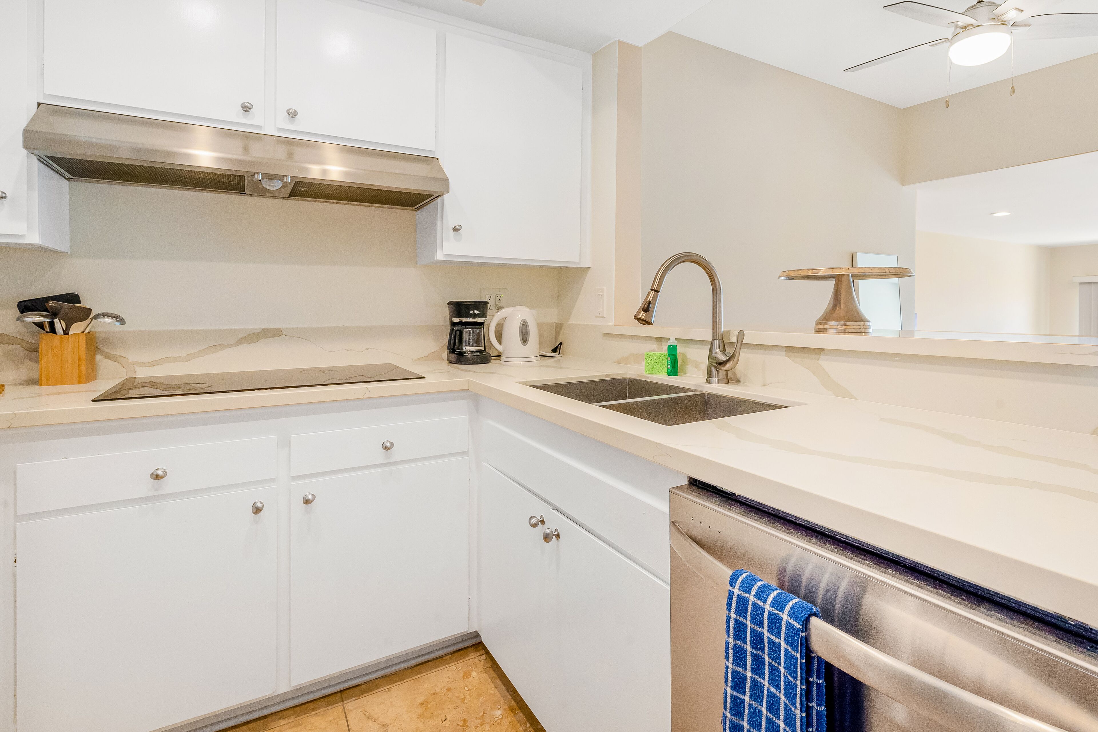 Charming condos with ocean view, balcony, full kitchen, & W/D