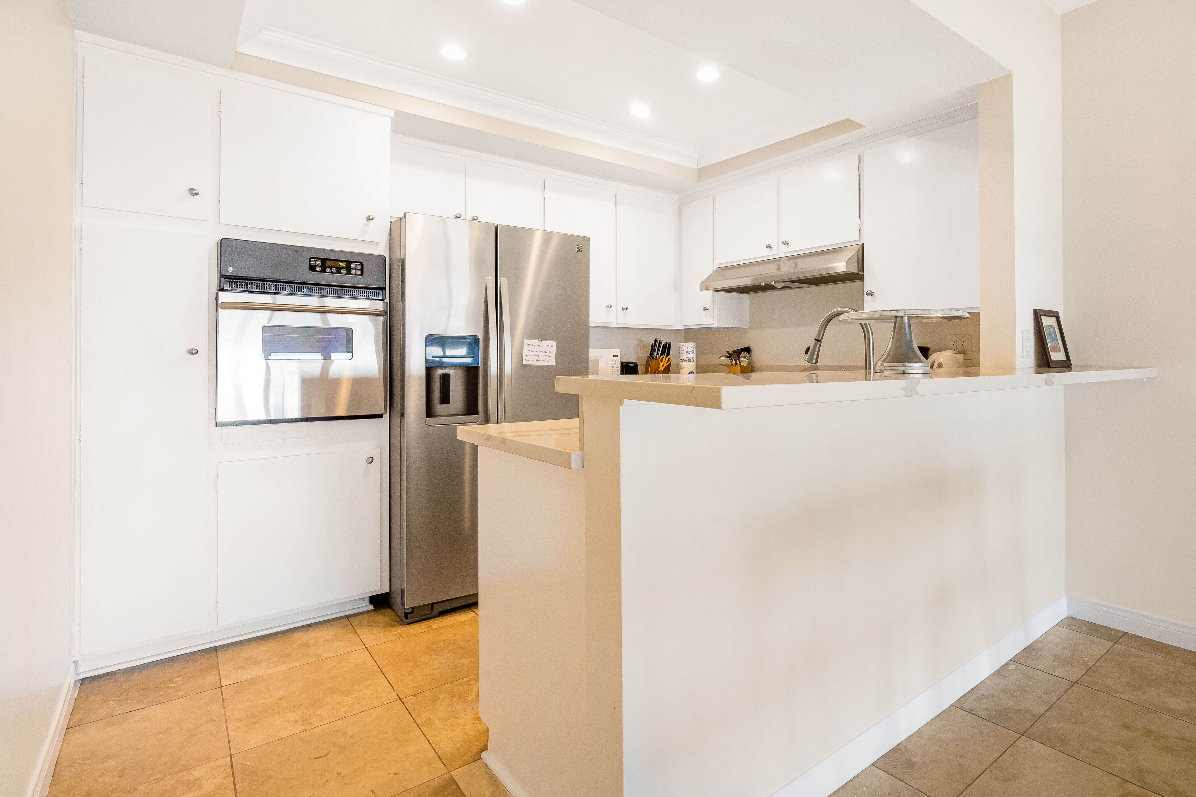 Charming condos with ocean view, balcony, full kitchen, & W/D