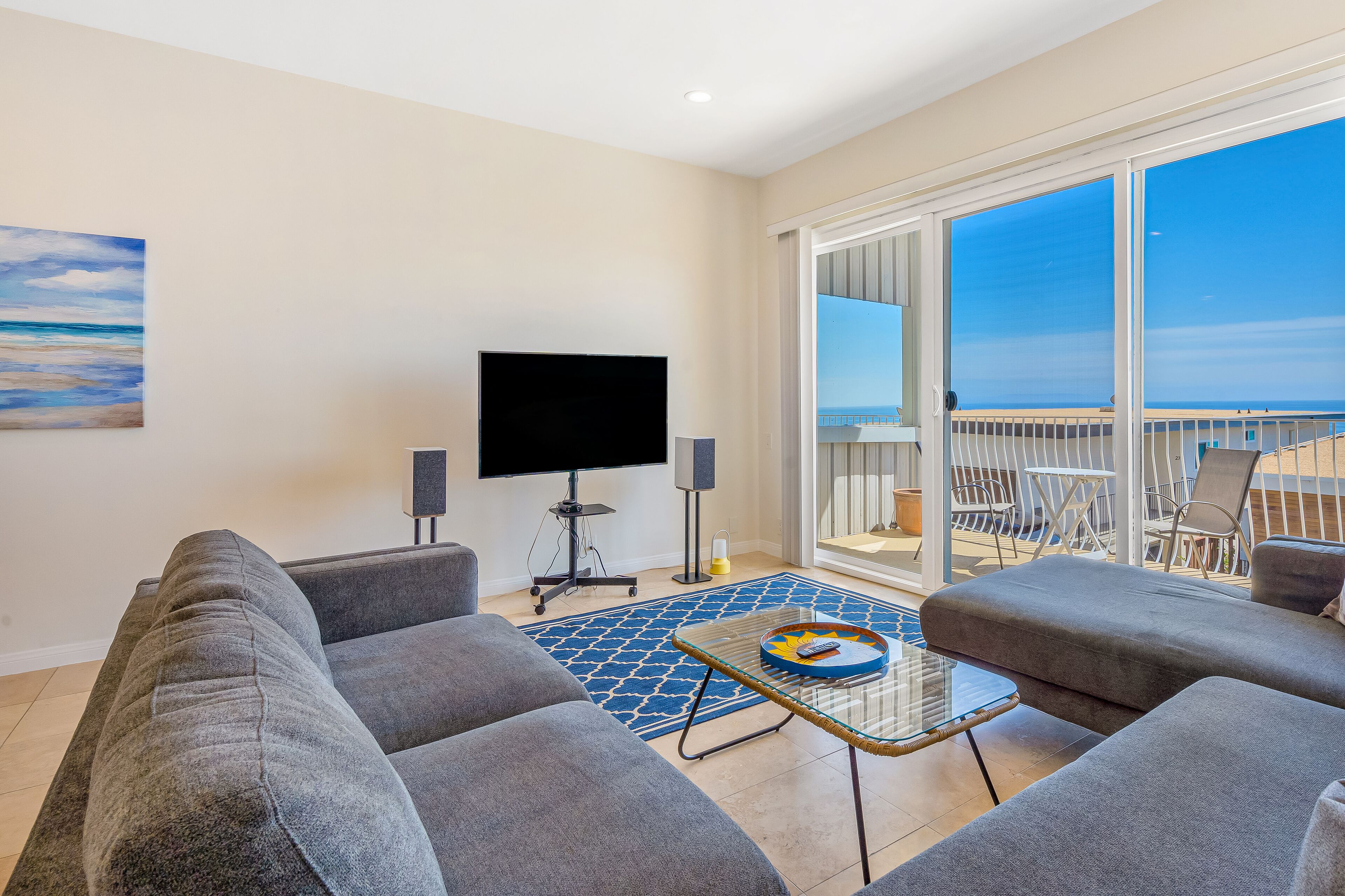 Charming condos with ocean view, balcony, full kitchen, & W/D