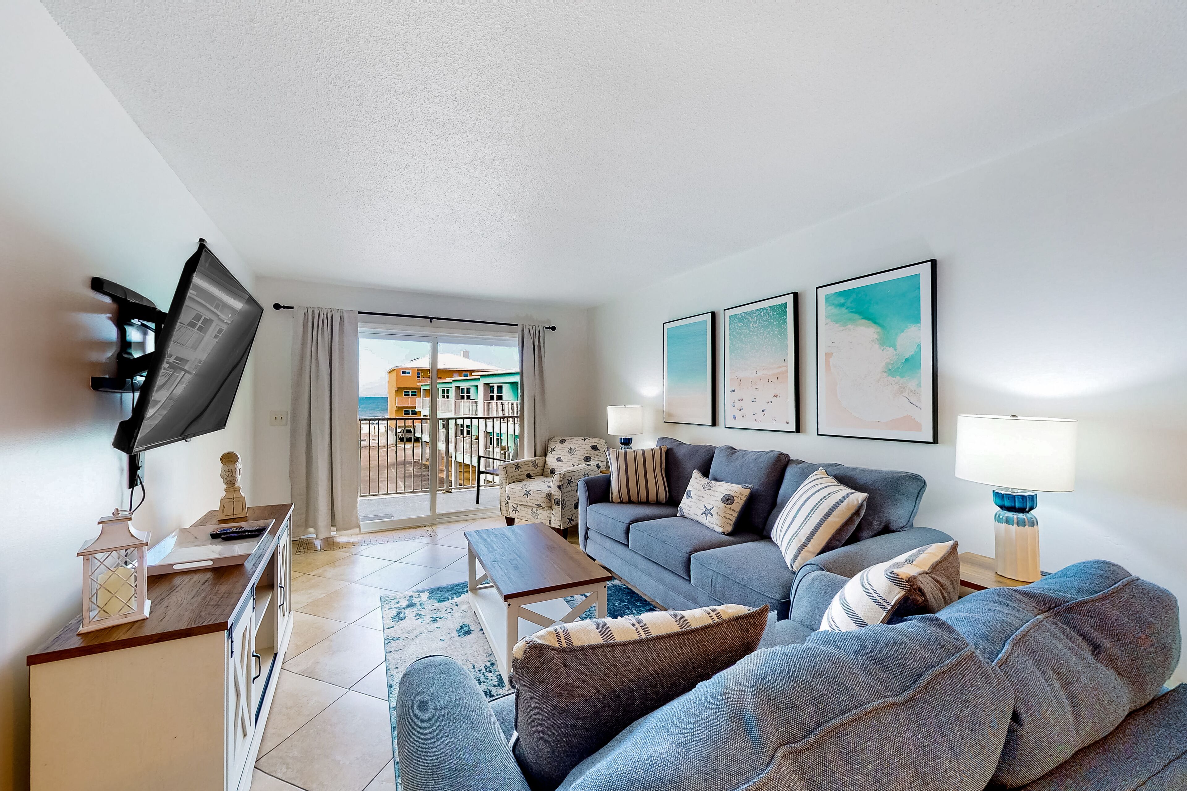 Coastal condo with pool & beach access - scenic balcony, central AC, and W/D