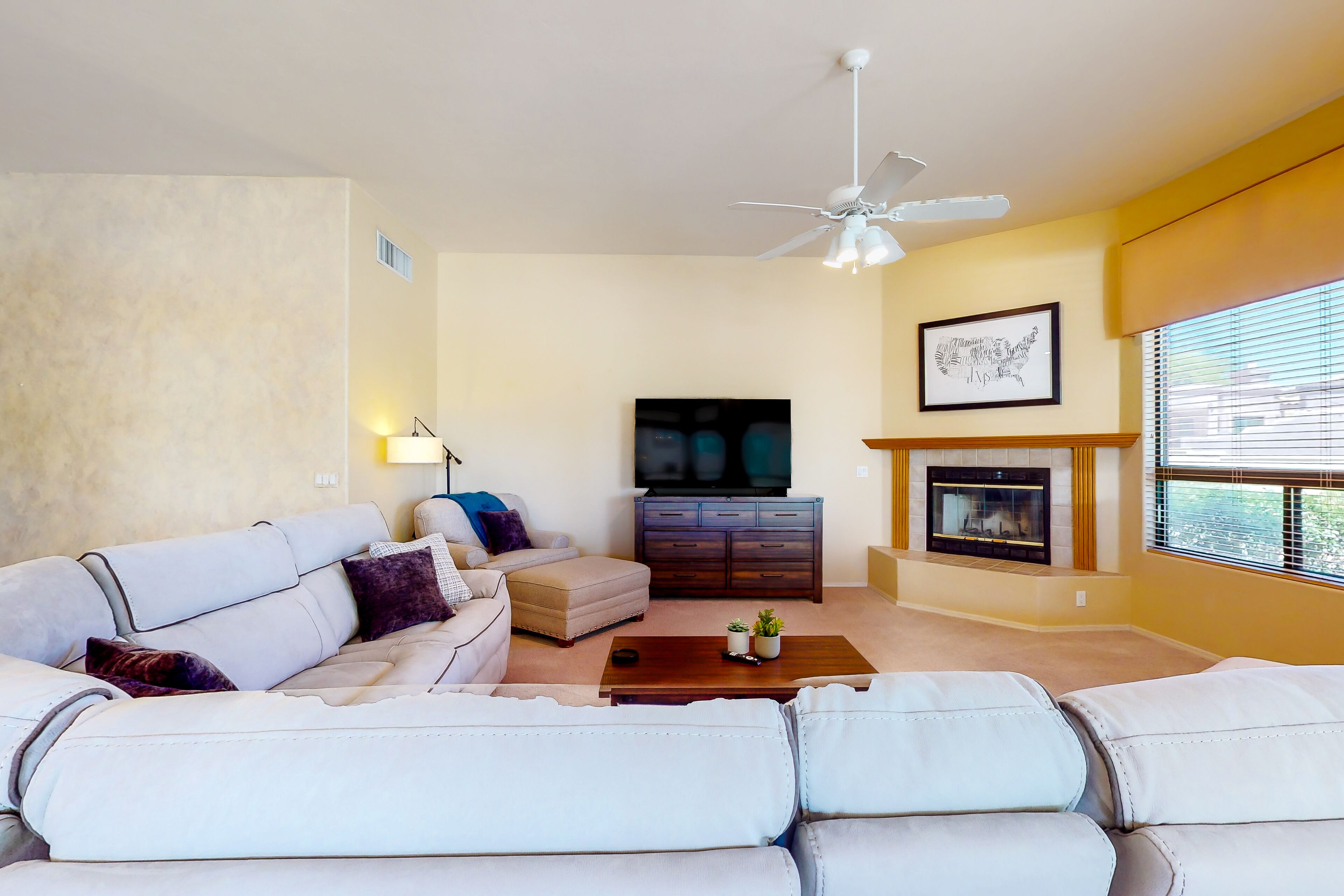 Spacious acreage home with a pool, hot tub, and putting green - mountain views