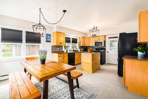 Fridge, microwave, oven, stovetop - Charming home with large backyard, firepit, grill, patio, and private W/D (Petoskey)