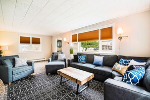 TV, foosball, table tennis - Charming home with large backyard, firepit, grill, patio, and private W/D (Petoskey)