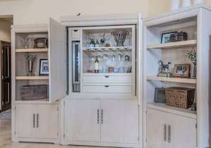 A compact storage unit with multiple compartments, including shelves and drawers, likely used for organizing personal items. - Charlie's Slopeside: Arrowhead Ski-In/Out, Steps to Lift, Sleeps 8, Heated Pool + Hot Tub (Edwards)