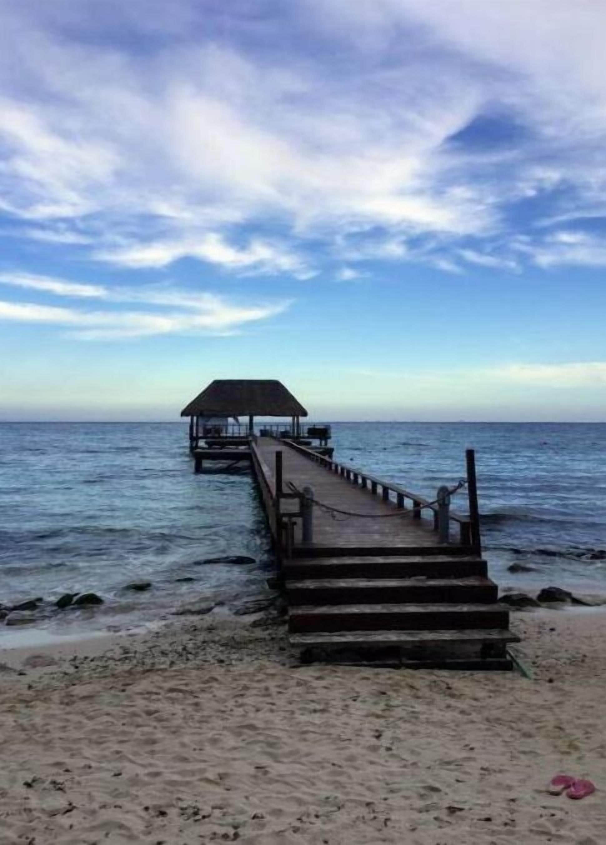 Una playa cerca, toallas de playa