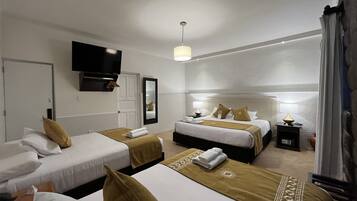 Family Room | In-room safe, blackout drapes, soundproofing, free WiFi