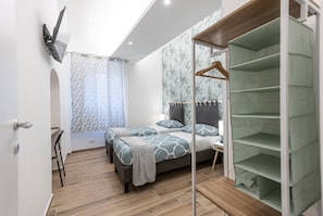 2 bedrooms, desk, iron/ironing board, travel crib