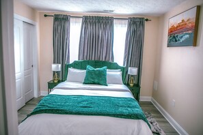 2 bedrooms, desk, iron/ironing board, travel cot