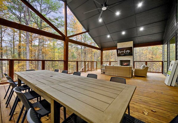 Outdoor dining - Luxury Creek Cabin w/ Slide, Hot Tub & Fire Pit (Broken Bow)