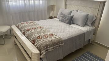 2 chambres, coffres-forts dans les chambres, fer et planche Ă repasser