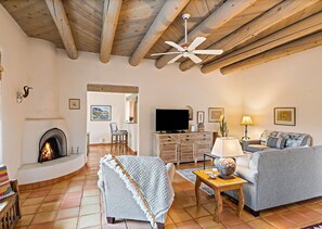 Smart TV, fireplace, DVD player, books