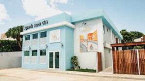 A building with a sign reading "Aquarela Beach Club". - SUITE 203 - 2 PEOPLE (Cabo Rojo)