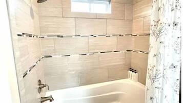 Hair dryer, towels, soap, shampoo