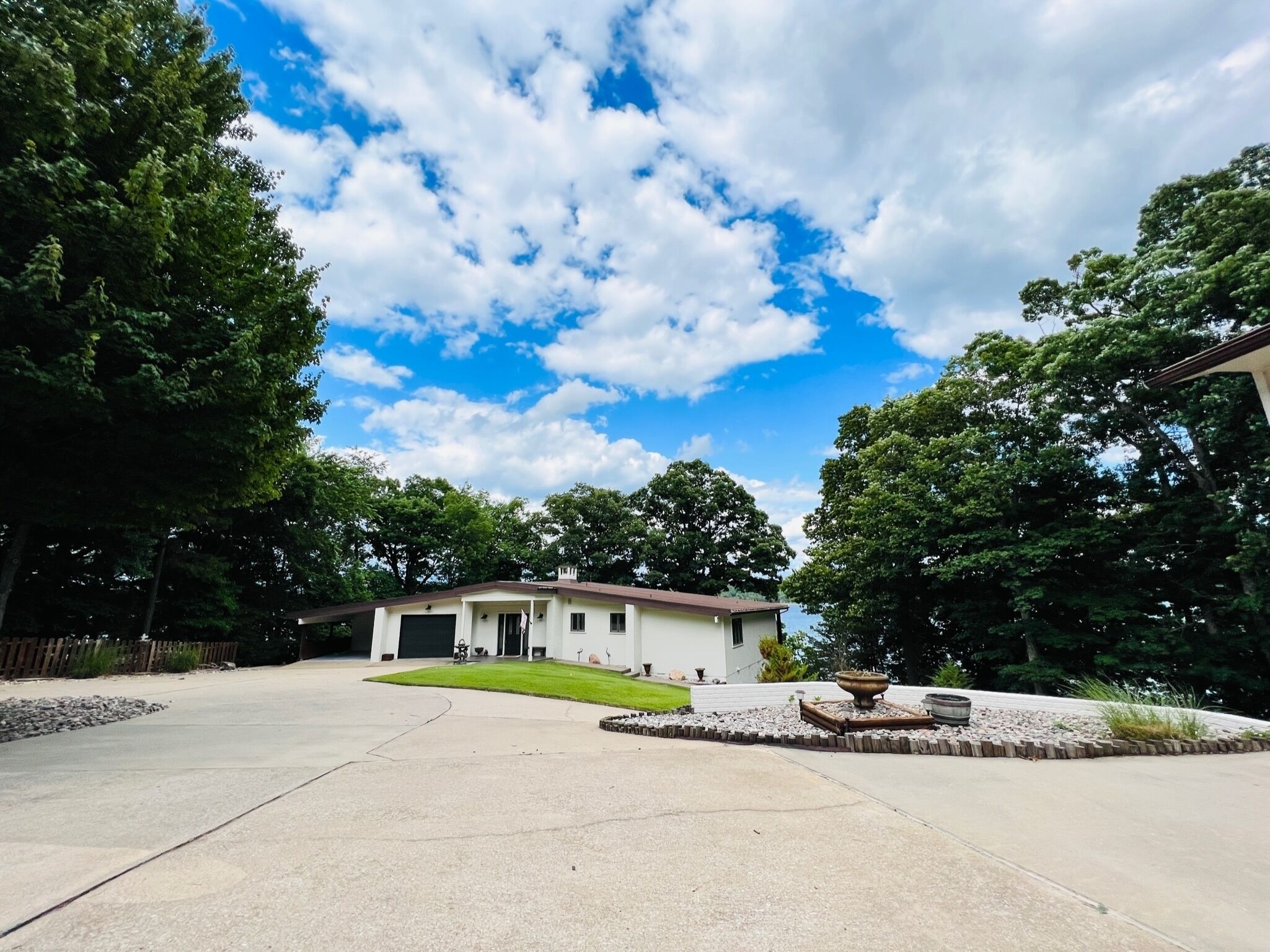 Gated home, right on the water, minutes from downtown Rogers!