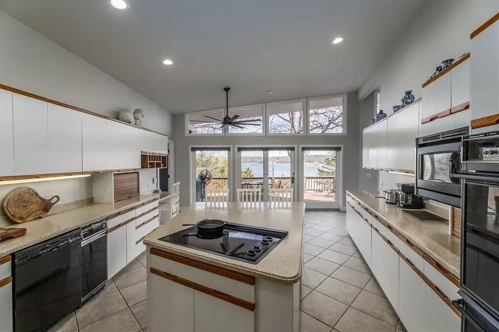 Gated home, right on the water, minutes from downtown Rogers!