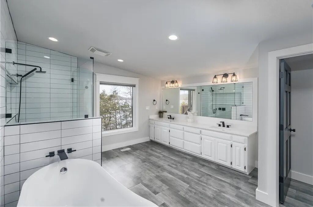 Gated home, right on the water, minutes from downtown Rogers!