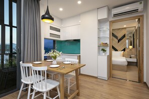 Family Apartment | Premium bedding, memory-foam beds, minibar, desk - Dolphin Hotel and Apartment (Da Nang)