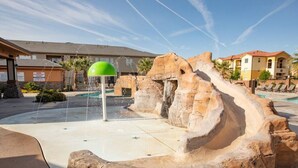 A water feature with a green dome and a rocky structure. - Spacious Oasis, Private Pool, Spa & Putting Green (Hurricane)