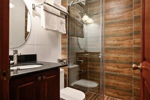 Shower, rainfall showerhead, designer toiletries, hair dryer