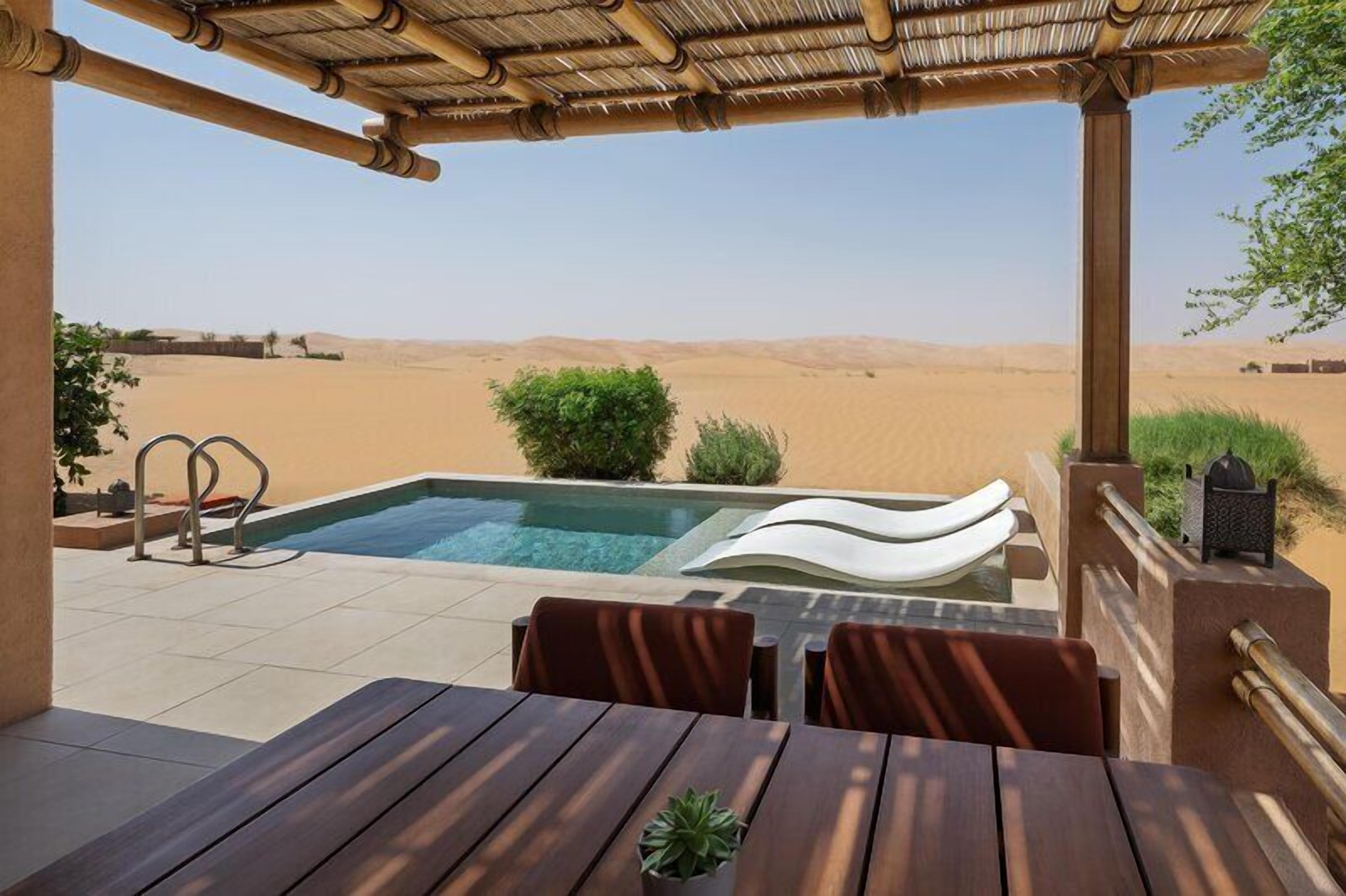 Outdoor pool, free cabanas, pool umbrellas