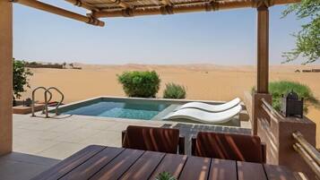 Outdoor pool, free cabanas, pool umbrellas
