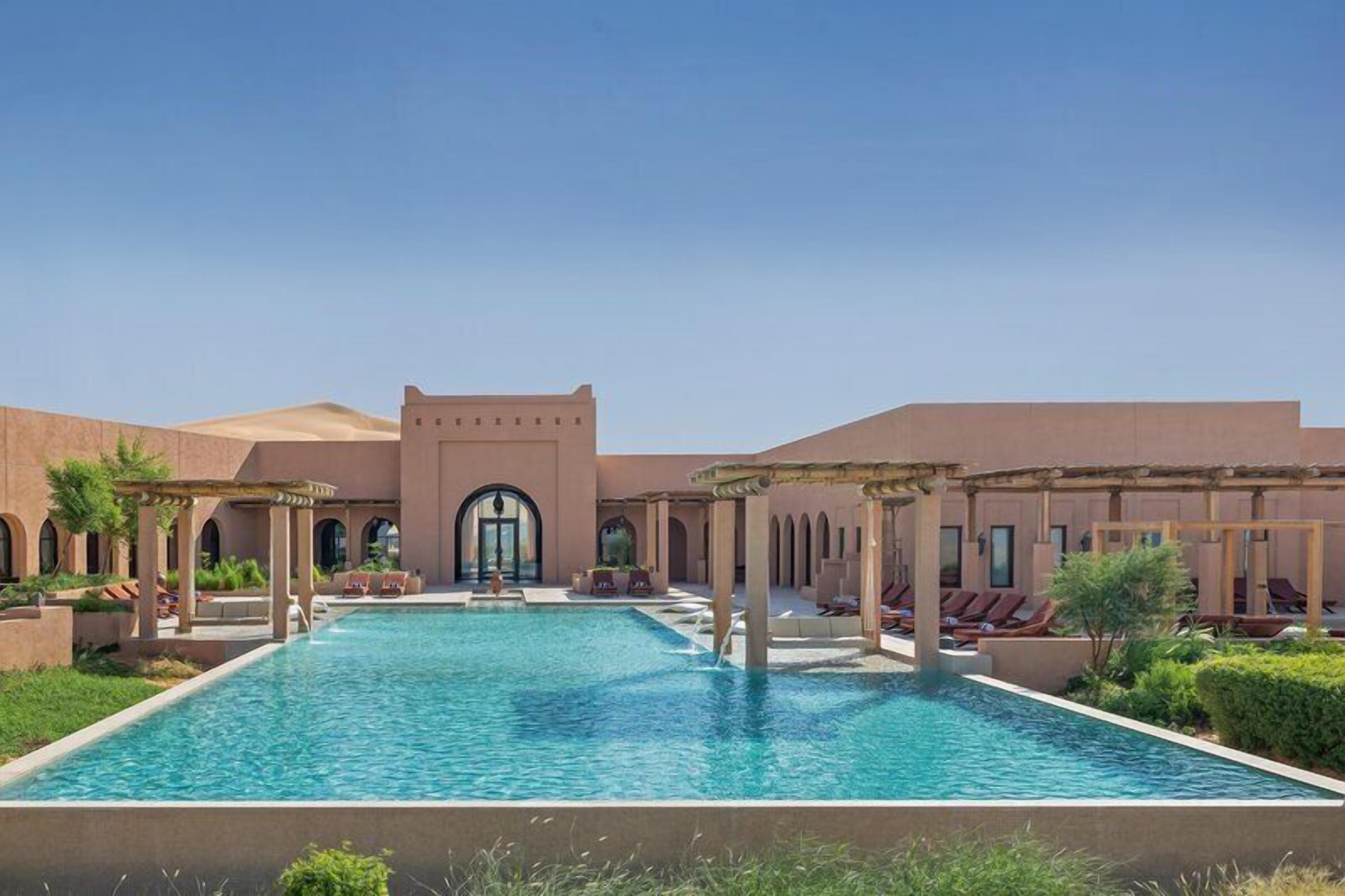 Outdoor pool, free cabanas, pool umbrellas