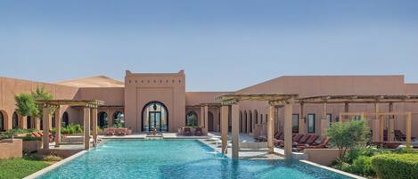 Outdoor pool, free cabanas, pool umbrellas