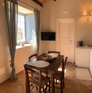 Apartamento superior | Sala de jantar