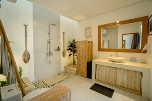 Shower, rainfall showerhead, hair dryer, towels