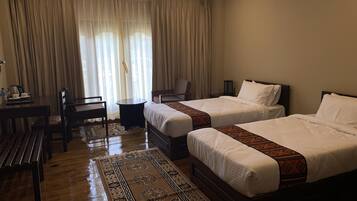 Desk, laptop workspace, blackout curtains, soundproofing