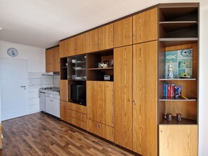 Fridge, stovetop, coffee/tea maker, toaster