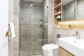 Shower, hair dryer, towels, soap