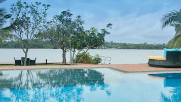 Outdoor pool, open 8:30 AM to 6:00 PM, pool umbrellas, sun loungers