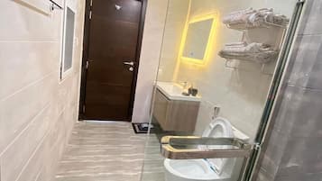Hair dryer, bidet, towels, soap