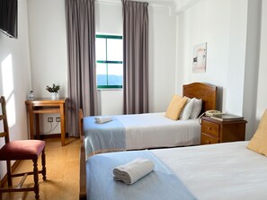 Single Room | Desk, blackout curtains, bed sheets