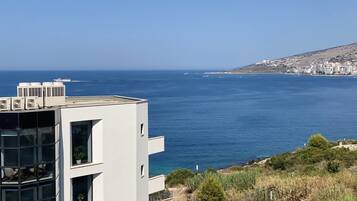 One-Bedroom Apartment with Side Sea View | Balcony view