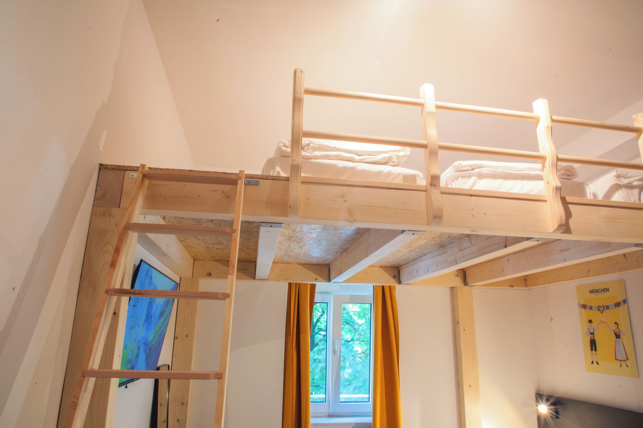 A room with a bunk bed, a ladder, a window with curtains, and a poster on the wall.