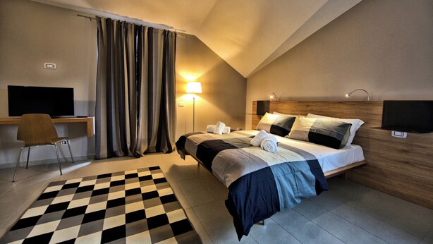 Unclassified image, 1 of 25, button - LEPINI SUITES (Patrica)