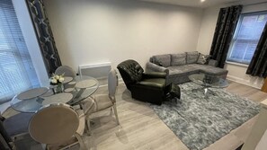 Apartment, 1 King Bed with Sofa bed | Living area | Fireplace