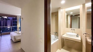 Bathtub, hair dryer, towels