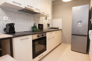 Apartment | Private kitchen | Full-size fridge, microwave, oven, cookware/dishes/utensils - The Kipseli Suite Sophisticated Cozy apt (Athens)