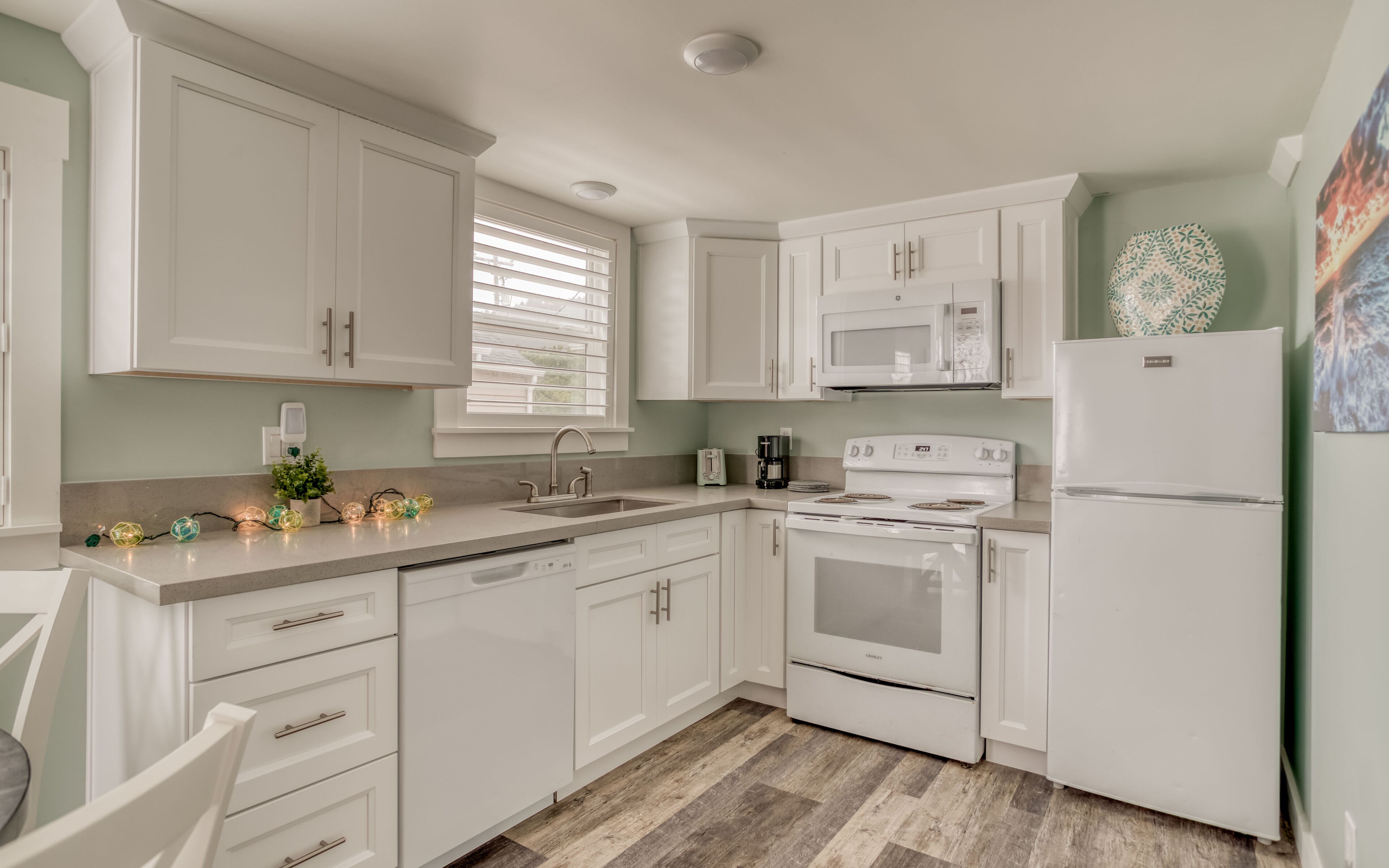 Completely Updated Cottage Features Bedrooms with TVs, Full Kitchen Just Steps t