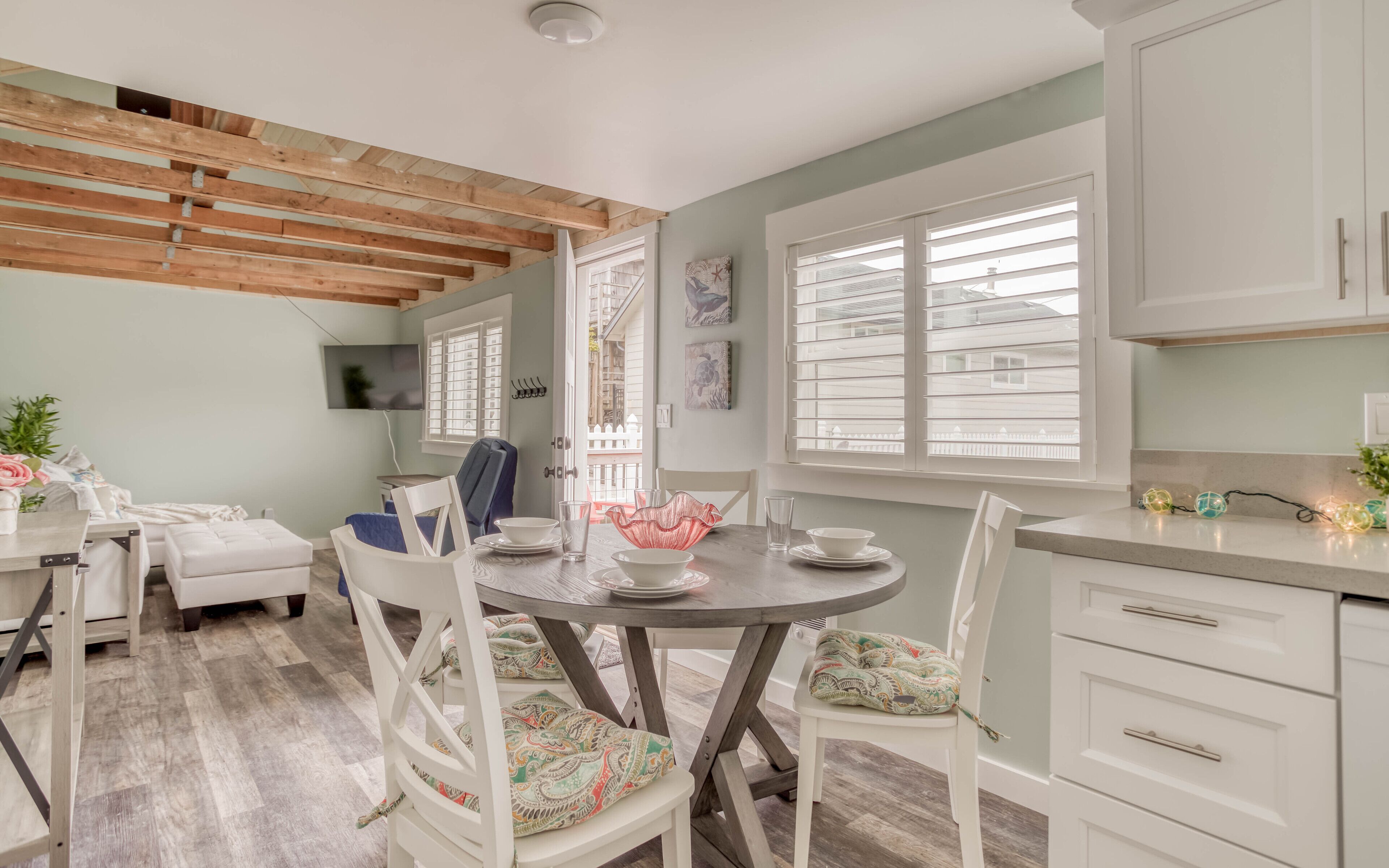 Completely Updated Cottage Features Bedrooms with TVs, Full Kitchen Just Steps t