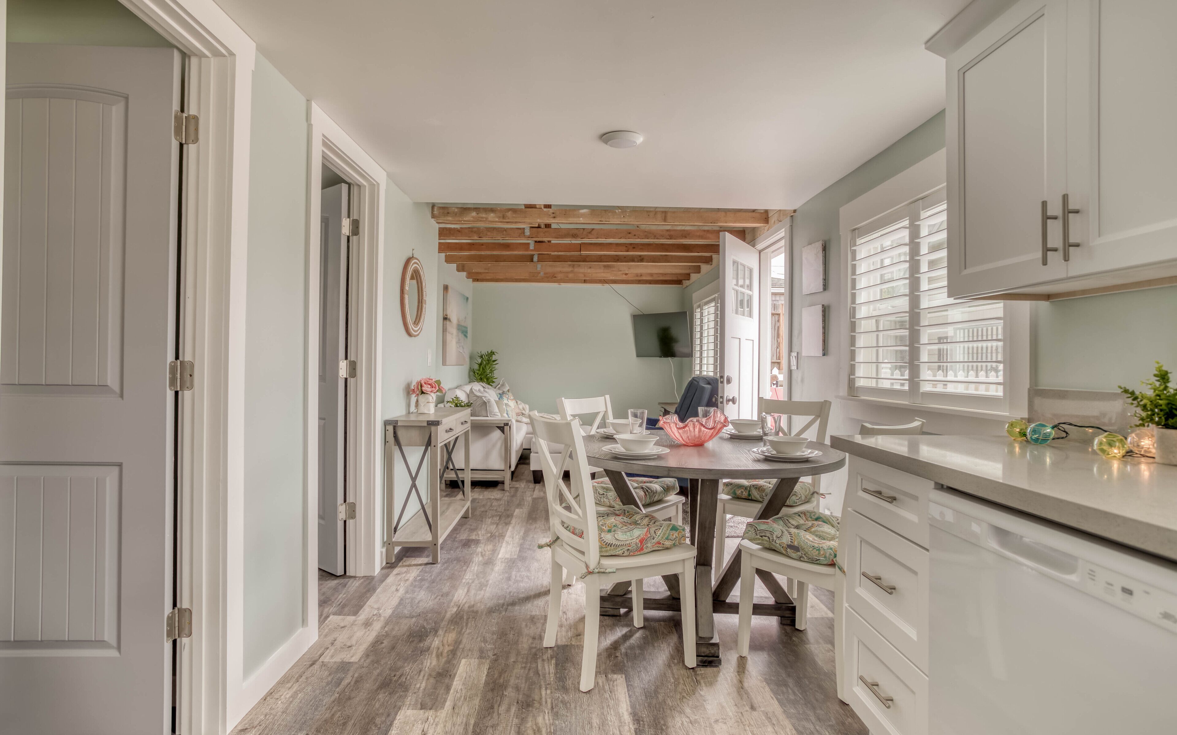 Completely Updated Cottage Features Bedrooms with TVs, Full Kitchen Just Steps t