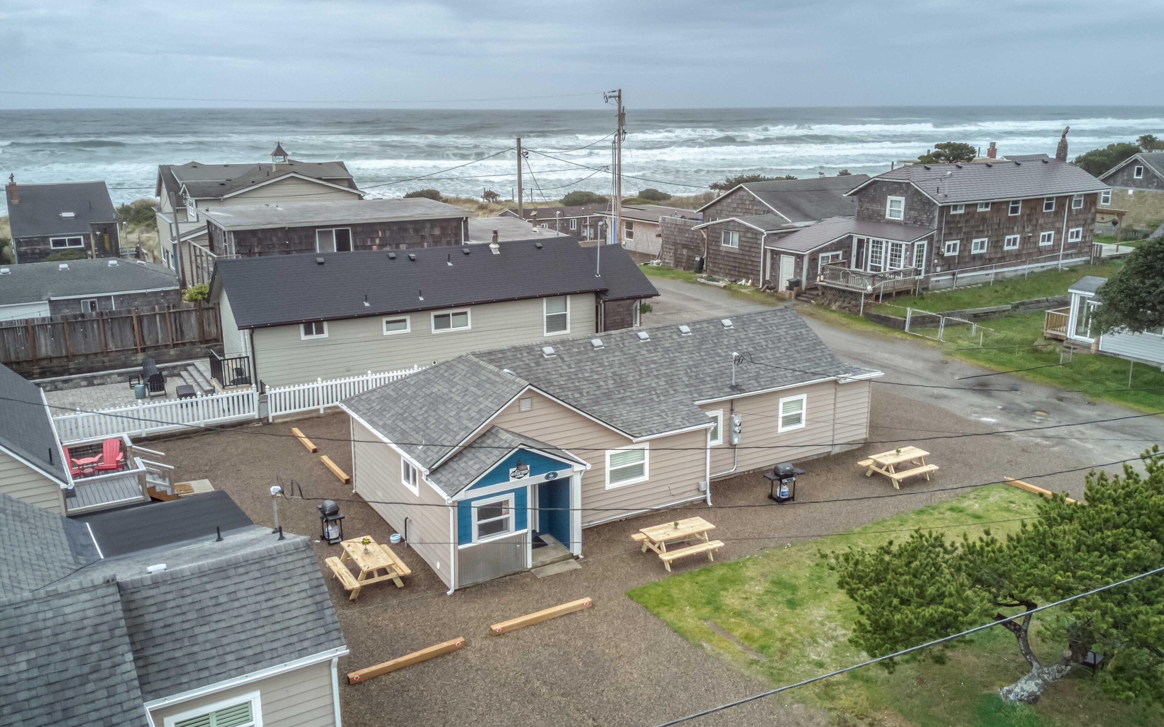 Vacation with Friends, Family in this Cottage Complex Steps from Rockaway Beach!