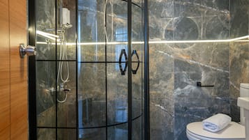 Shower, rainfall showerhead, designer toiletries, hair dryer