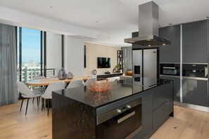 Fridge, microwave, oven, stovetop - Sea Point Penthouse Rooftop Deck with Jacuzzi (Cape Town)