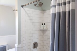 Bathtub, hair dryer, towels